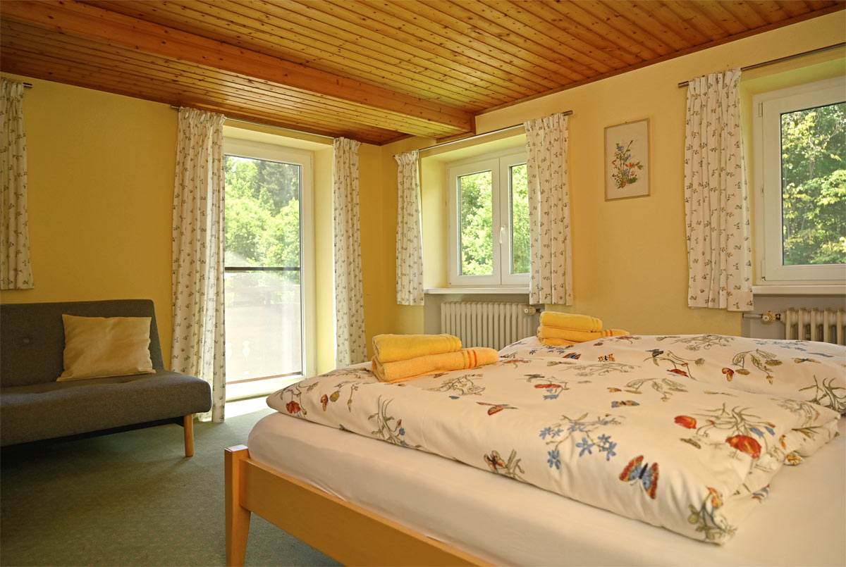 Schlafzimmer mit Sofa